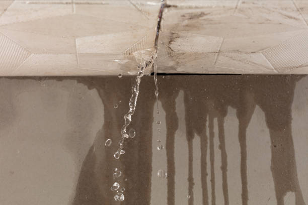 Professional Flood Damage Cleanup technician working in West Stewartstown, NH